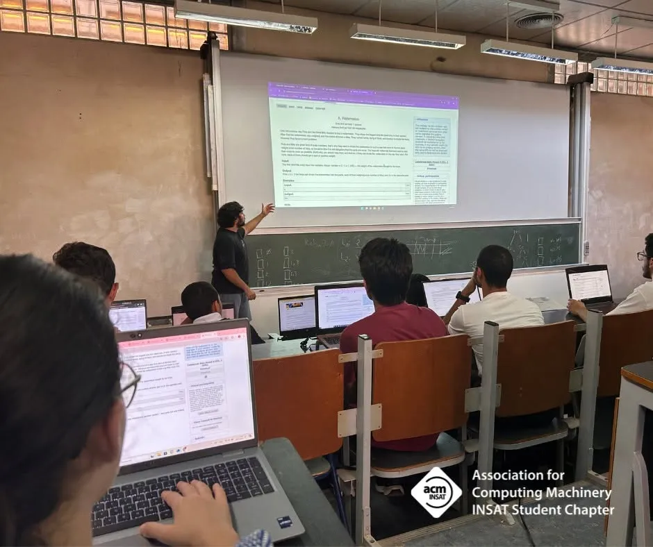 Leading a competitive programming training session at INSAT